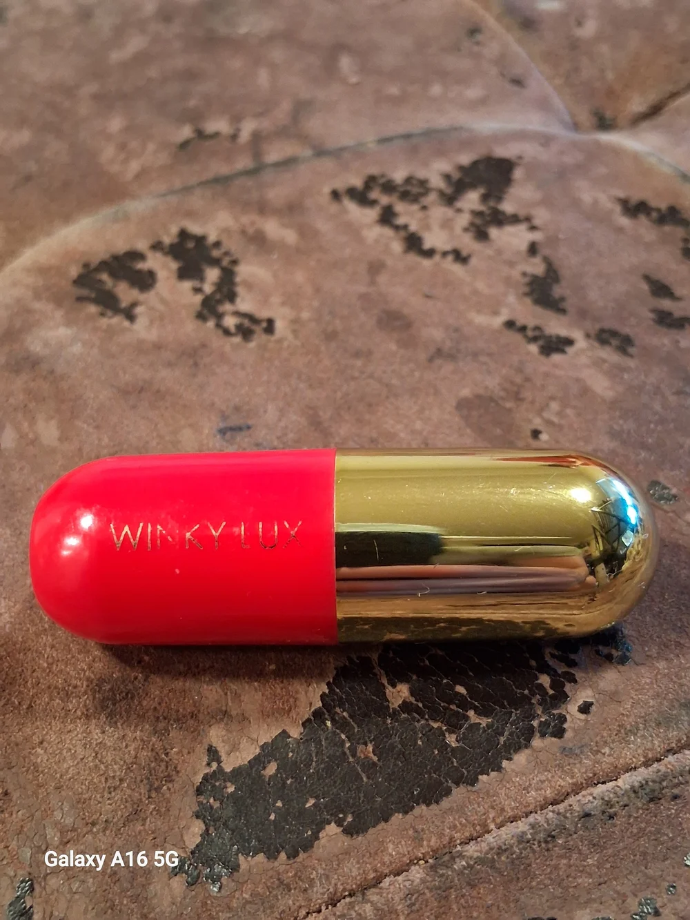 WINKY LUX Gold-Capped Lipstick in Bright Coral Pink